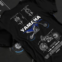 Black T-shirt laid flat with natural fabric folds, featuring Yamaha YZ250 racing street enthusiast performance motorsport graphic.