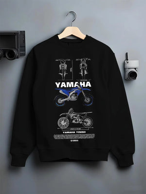 Black crewneck sweatshirt on a hanger against a grey wall, featuring Yamaha YZ250 racing street enthusiast performance graphic.