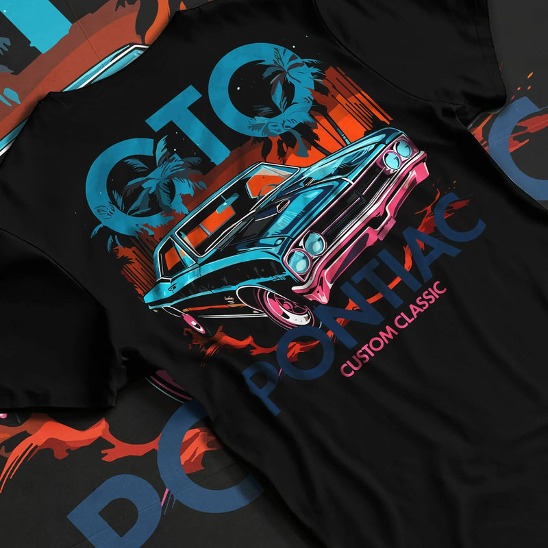 Black T-shirt featuring Pontiac GTO classic muscle car graphic in bold retro streetwear design with neon palm artwork.