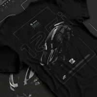 Black T-shirt laid flat with natural fabric folds, featuring BMW 750I rs turbo motorsport euro german street graphic.