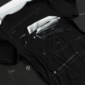 Black T-shirt laid flat with natural fabric folds, featuring BMW 750I rs turbo motorsport euro german street graphic.