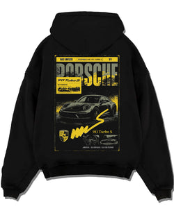 Black pullover hoodie laid flat on a white background, featuring Porsche 911 Turbo S rs 911 turbo racing german street graphic.