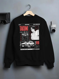 Black crewneck sweatshirt on a hanger against a grey wall, featuring AE86 racing drift japanese initial d street retro graphic.