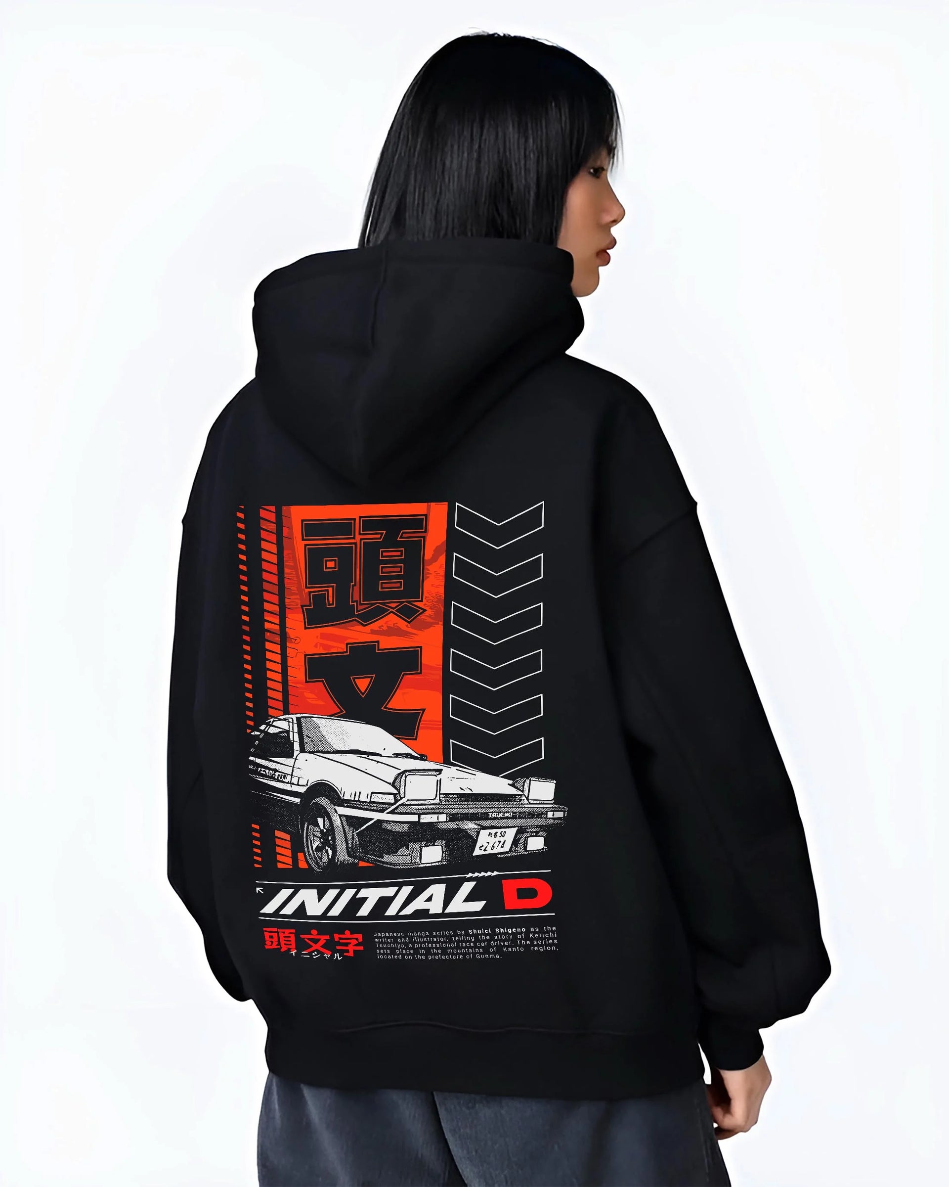 Black hoodie worn by a female model, back view, featuring AE86 racing drift jdm japanese initial d street legend graphic.