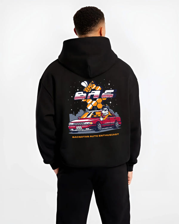 Black hoodie worn by a male model, back view, featuring street retro enthusiast racing performance motorsport automotive graphic.