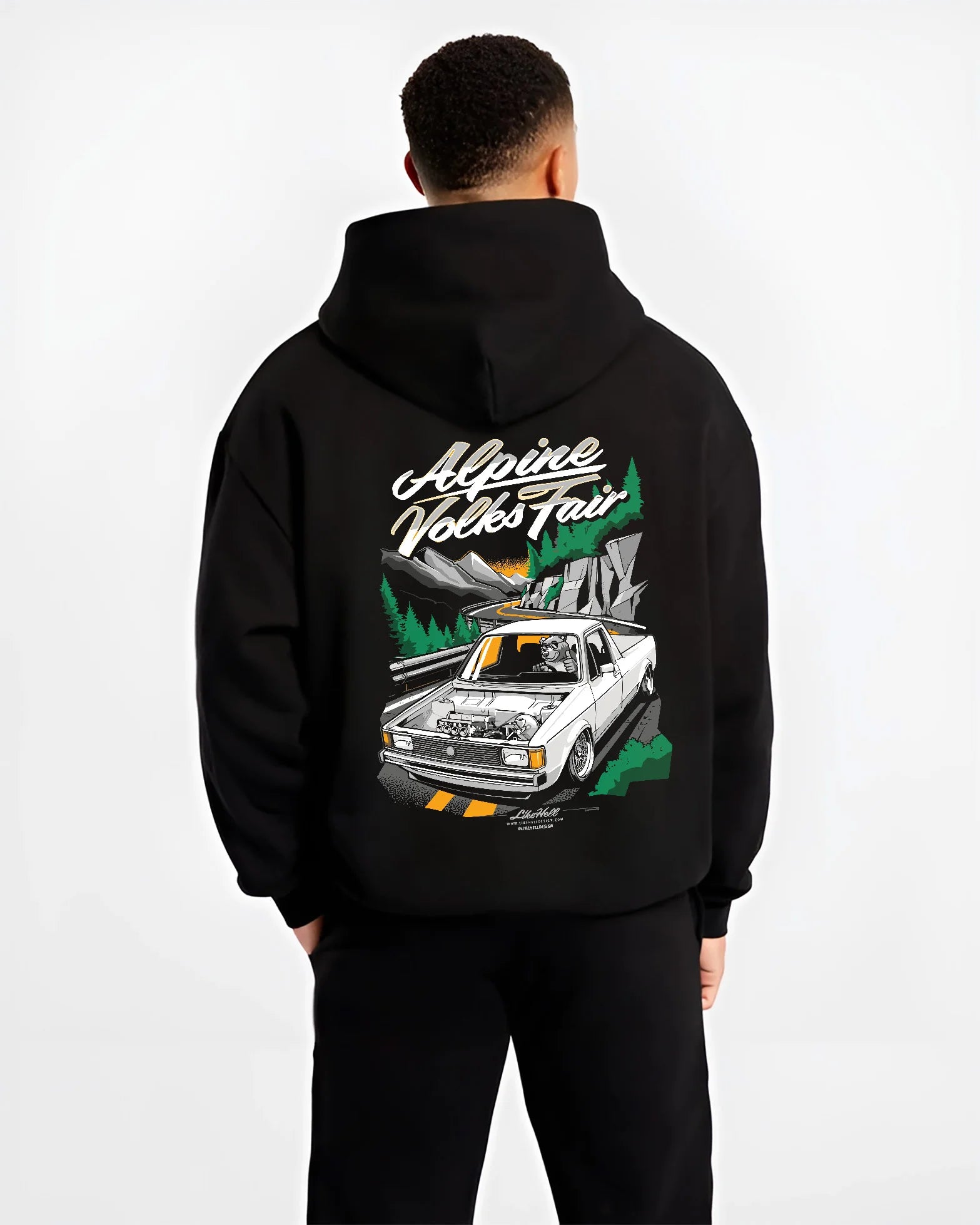 Black hoodie worn by a male model, back view, featuring Volkswagen street retro racing performance motorsport automotive graphic.