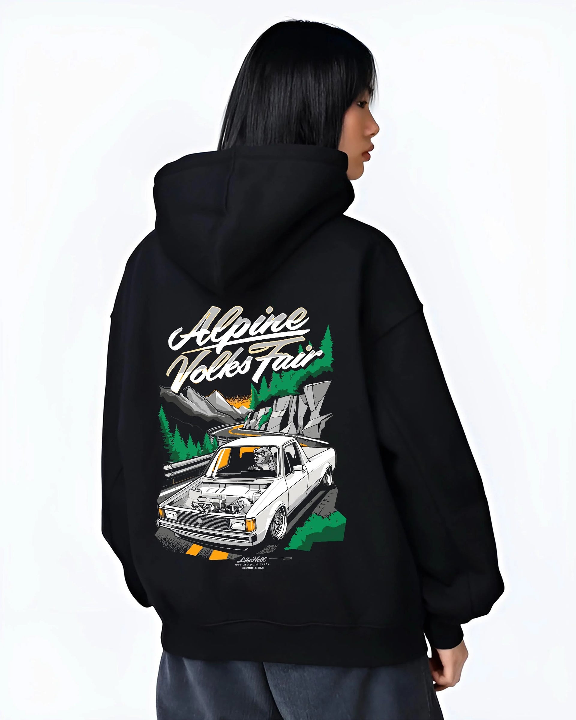 Black hoodie worn by a female model, back view, featuring Volkswagen street retro racing performance motorsport automotive graphic.