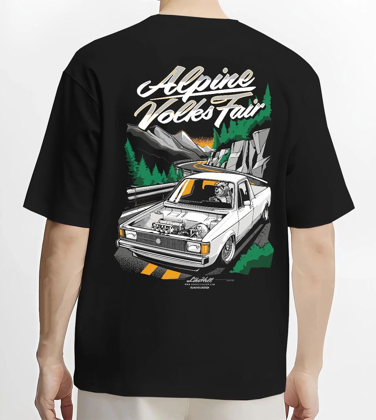 Black T-shirt worn by a male model, back view, featuring Volkswagen street retro racing performance motorsport automotive graphic.