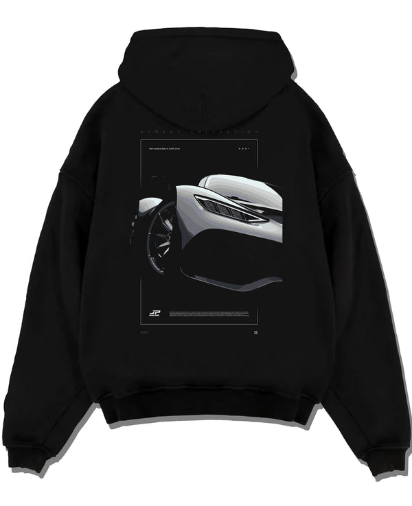 Black pullover hoodie laid flat on a white background, featuring Mercedes-Benz AMG rs racing motorsport street performance graphic.