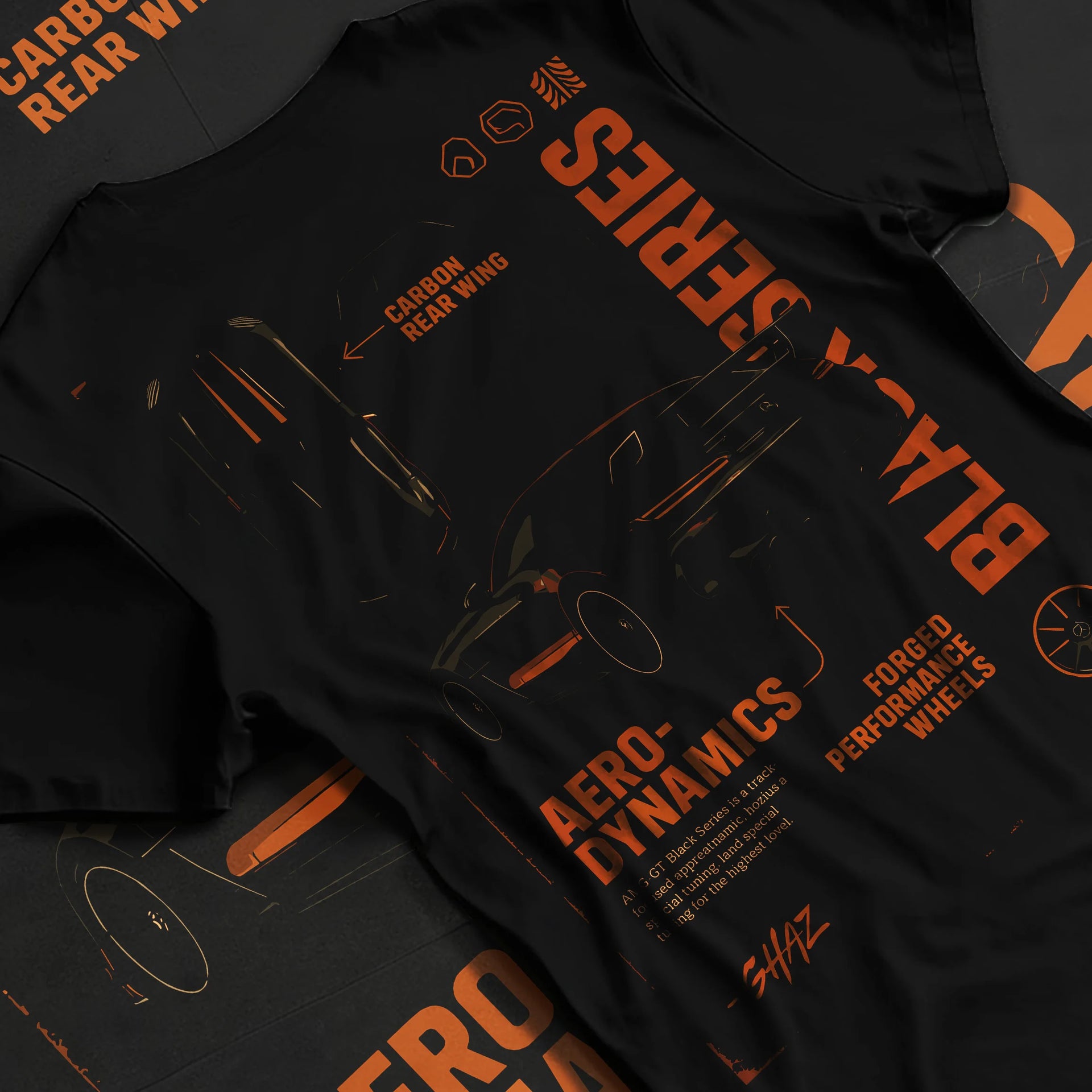 Black T-shirt laid flat with natural fabric folds, featuring Mercedes-Benz AMG rs racing motorsport street performance blkamg.