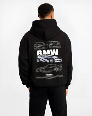 Black hoodie worn by a male model, back view, featuring BMW racing drift german tuner enthusiast street performance graphic.