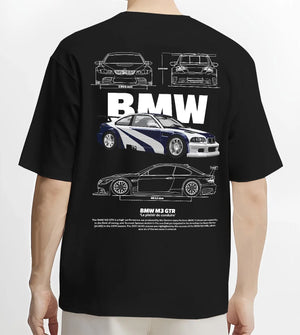 Black T-shirt worn by a male model, back view, featuring BMW racing drift german tuner enthusiast street performance graphic.