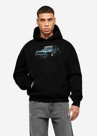Black hoodie worn by a male model, front view, featuring BMW E30 rs drift jdm stance widebody racing graphic performance.