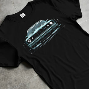 Black T-shirt laid flat with natural fabric folds, featuring BMW M3 rs drift classic racing street performance graphic.
