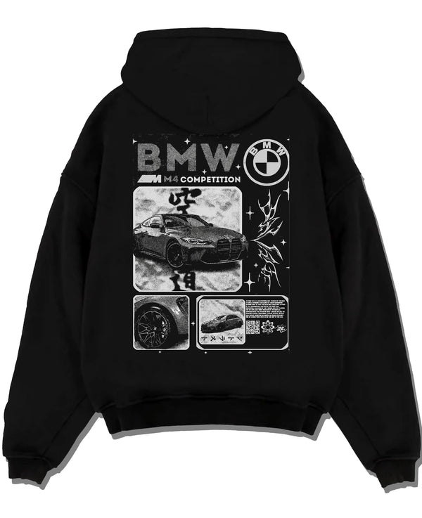 Black pullover hoodie laid flat on a white background, featuring BMW M4 german racing street performance motorsport graphic.