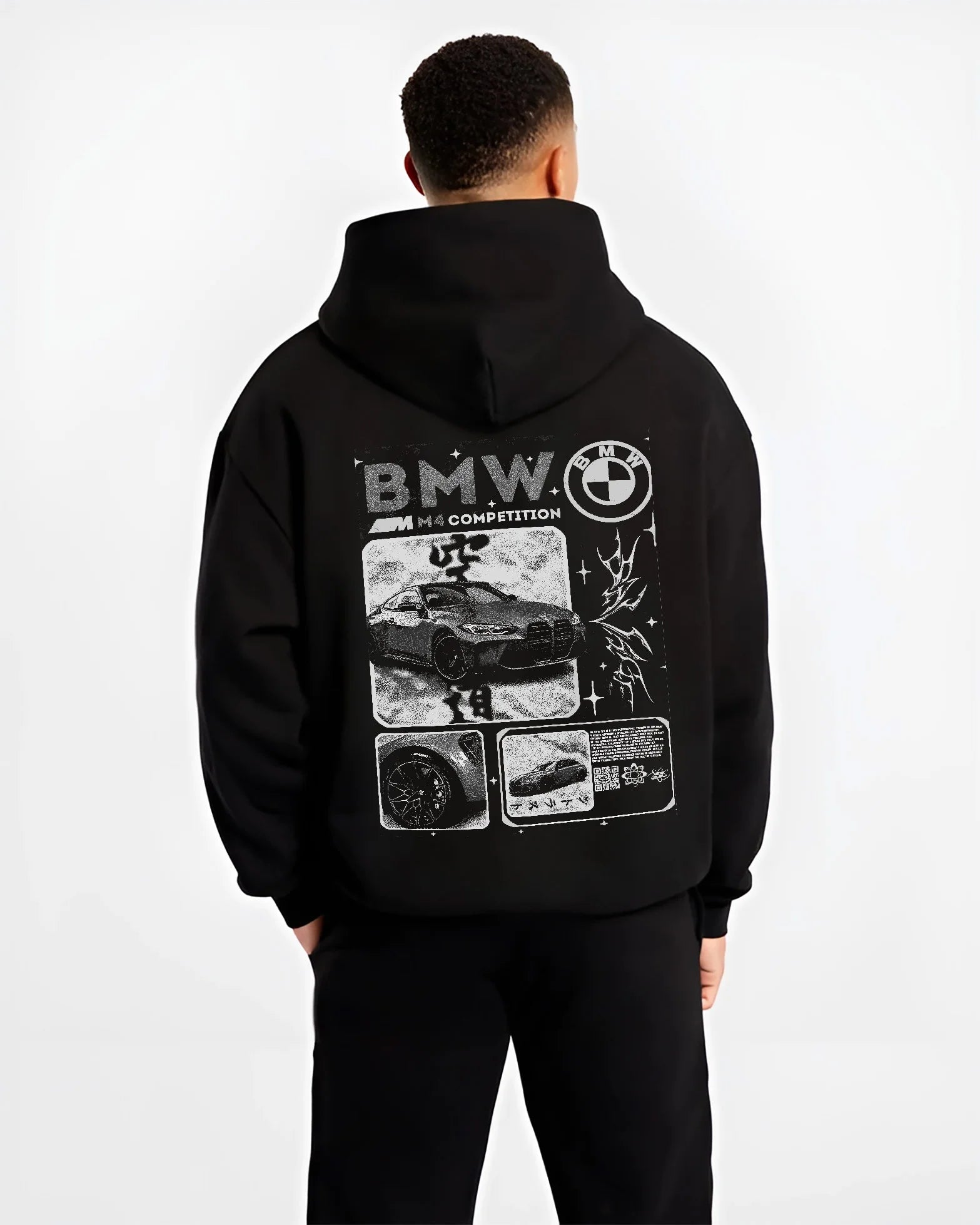 Black hoodie worn by a male model, back view, featuring BMW M4 german racing street performance motorsport automotive graphic.