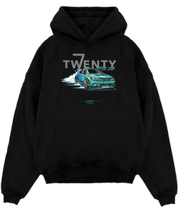 Black pullover hoodie laid flat on a white background, featuring BMW turbo drift racing street performance motorsport graphic.