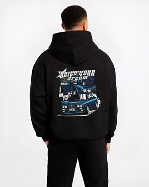Black hoodie worn by a male model, back view, featuring BMW E30 jdm japanese retro classic enthusiast racing graphic.