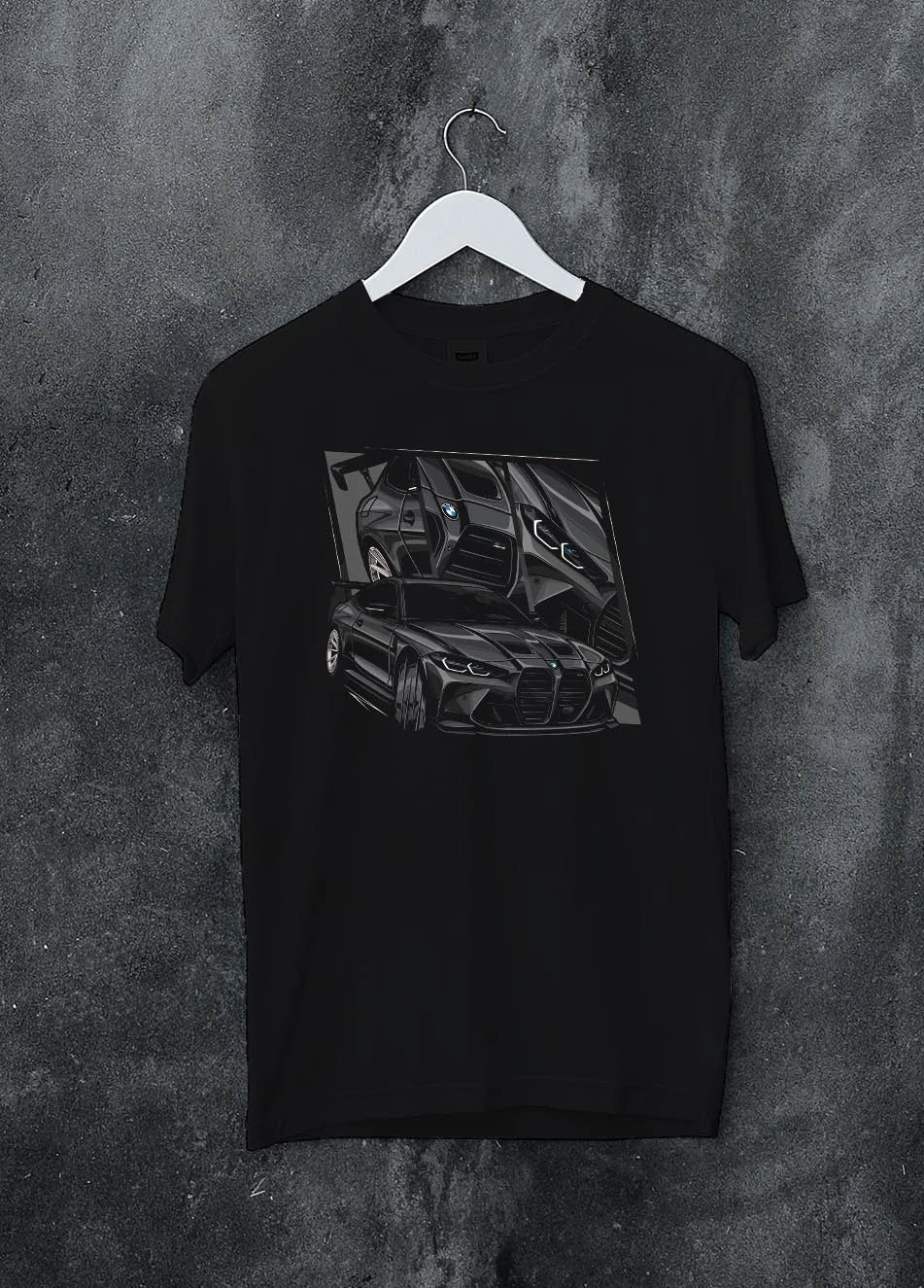 Black crewneck T-shirt on a hanger against a grey wall, featuring BMW M4 german tuner street racing performance motorsport graphic.
