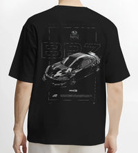 Black T-shirt worn by a male model, back view, featuring Subaru BRZ rs racing drift formula motorsport jdm street graphic.