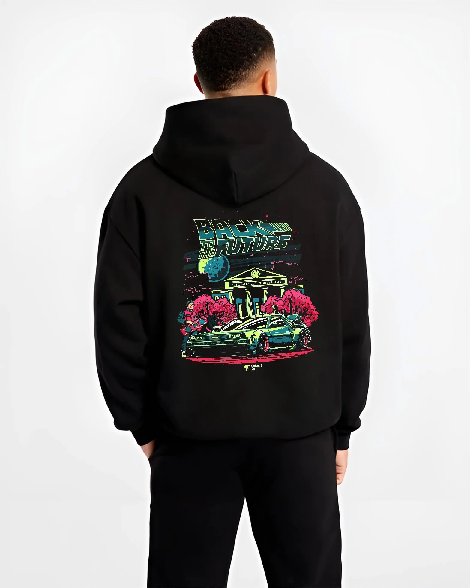 Black hoodie worn by a male model, back view, featuring DeLorean DMC-12 street retro classic racing performance motorsport graphic.