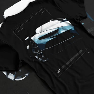 Black T-shirt laid flat with natural fabric folds, featuring Bugatti racing speed street performance motorsport automotive graphic.