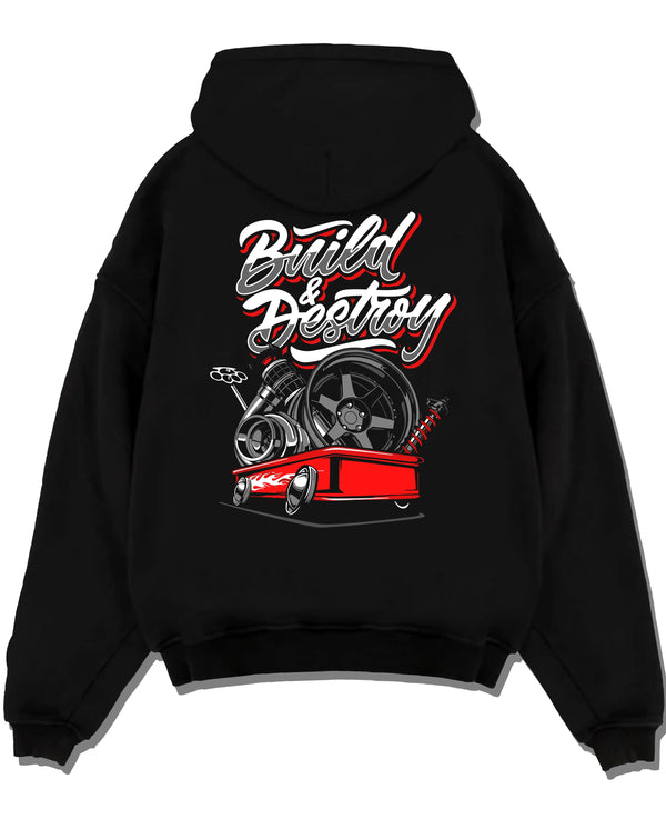 Black pullover hoodie laid flat on a white background, featuring racing street performance motorsport automotive enthusiast graphic.