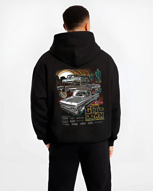 Black hoodie worn by a male model, back view, featuring Chevrolet Corvette C8R gt3 rs corvette racing motorsport american graphic.