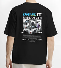 Black T-shirt worn by a male model, back view, featuring muscle retro vintage classic enthusiast racing street performance graphic.