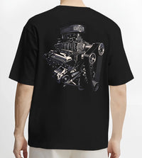 Black T-shirt worn by a male model, back view, featuring street enthusiast racing performance motorsport automotive power graphic.