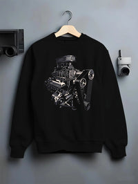 Black crewneck sweatshirt on a hanger against a grey wall, featuring street enthusiast racing performance motorsport graphic.