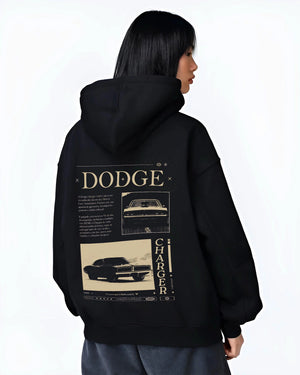 Black hoodie worn by a female model, back view, featuring Dodge Charger muscle street retro vintage enthusiast racing graphic.