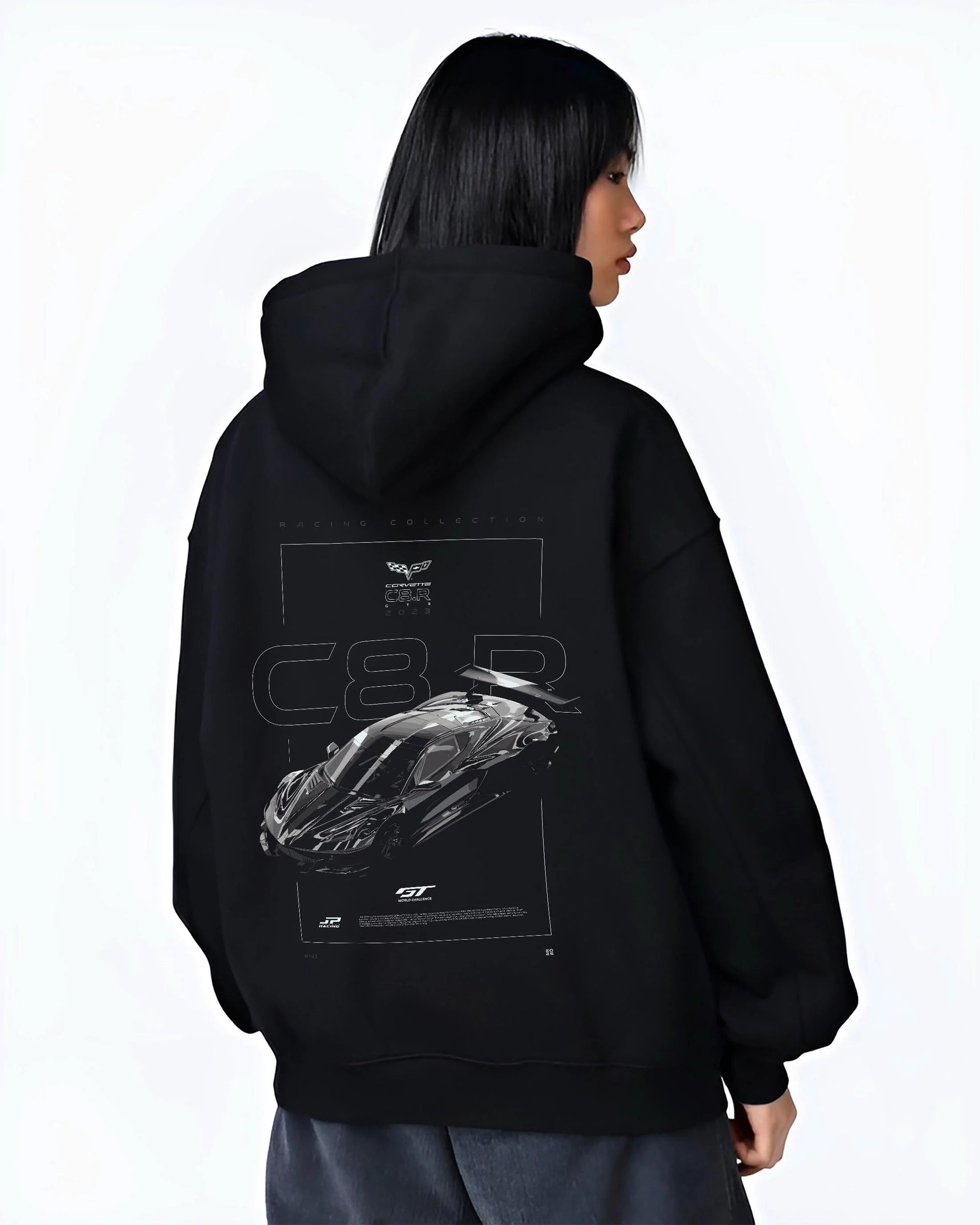 Black hoodie worn by a female model, back view, featuring Chevrolet Corvette C8 corvette racing american muscle street graphic.