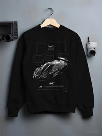 Black crewneck sweatshirt on a hanger against a grey wall, featuring Chevrolet Corvette C8 corvette racing american muscle graphic.
