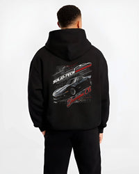 Black hoodie worn by a male model, back view, featuring Chevrolet rs racing muscle street retro classic enthusiast graphic.
