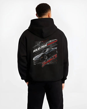 Black hoodie worn by a male model, back view, featuring Chevrolet rs racing muscle street retro classic enthusiast graphic.