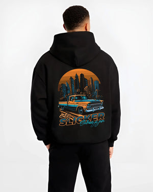 Black hoodie worn by a male model, back view, featuring Chevrolet SKYLINE retro vintage classic racing street performance graphic.