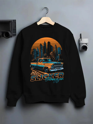 Black crewneck sweatshirt on a hanger against a grey wall, featuring Chevrolet SKYLINE retro vintage classic racing street graphic.