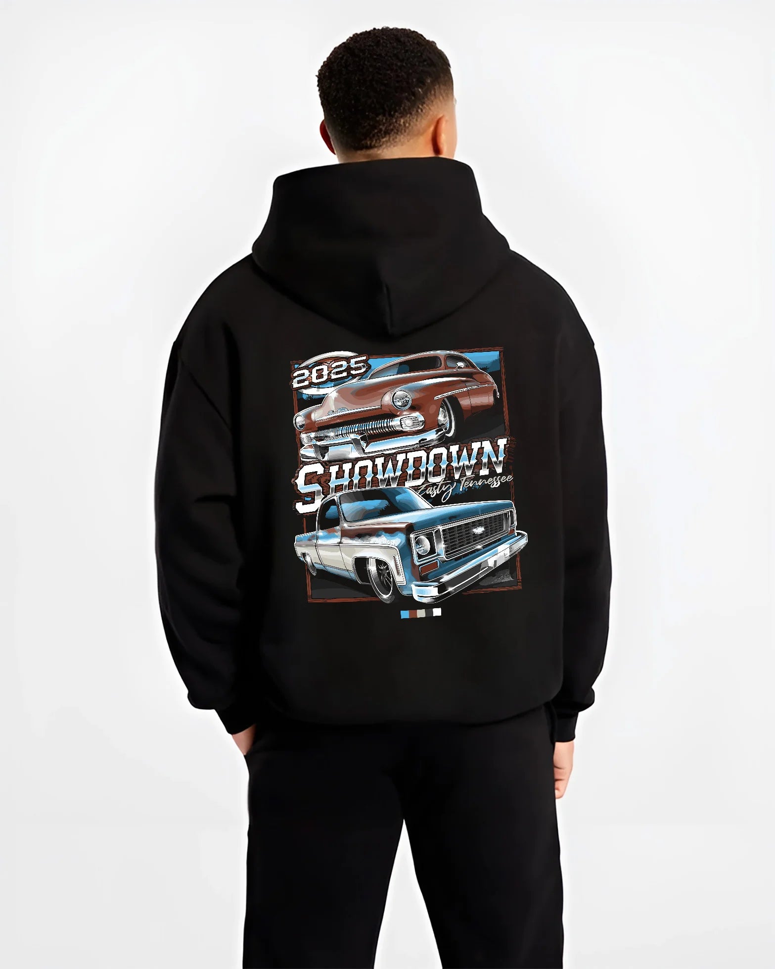 Black hoodie worn by a male model, back view, featuring racing american muscle retro vintage classic show street graphic.