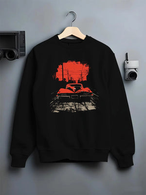 Black crewneck sweatshirt on a hanger against a grey wall, featuring Chevrolet Corvette muscle retro classic enthusiast graphic.
