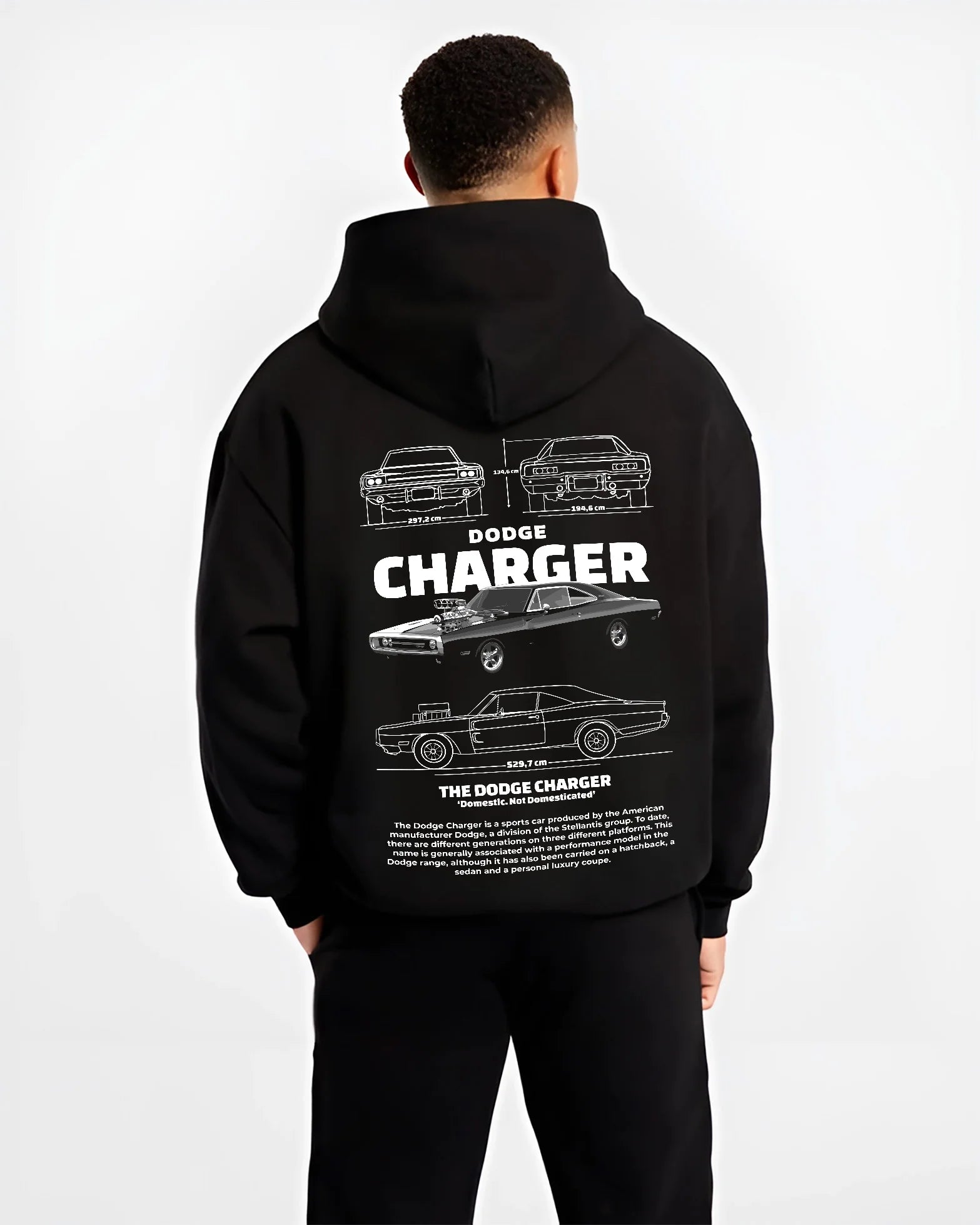 Black hoodie worn by a male model, back view, featuring Dodge Charger rs muscle street retro classic enthusiast graphic.