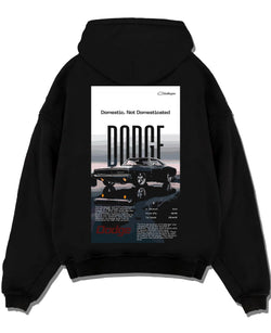 Black pullover hoodie laid flat on a white background, featuring Dodge Challenger american muscle street retro classic graphic.