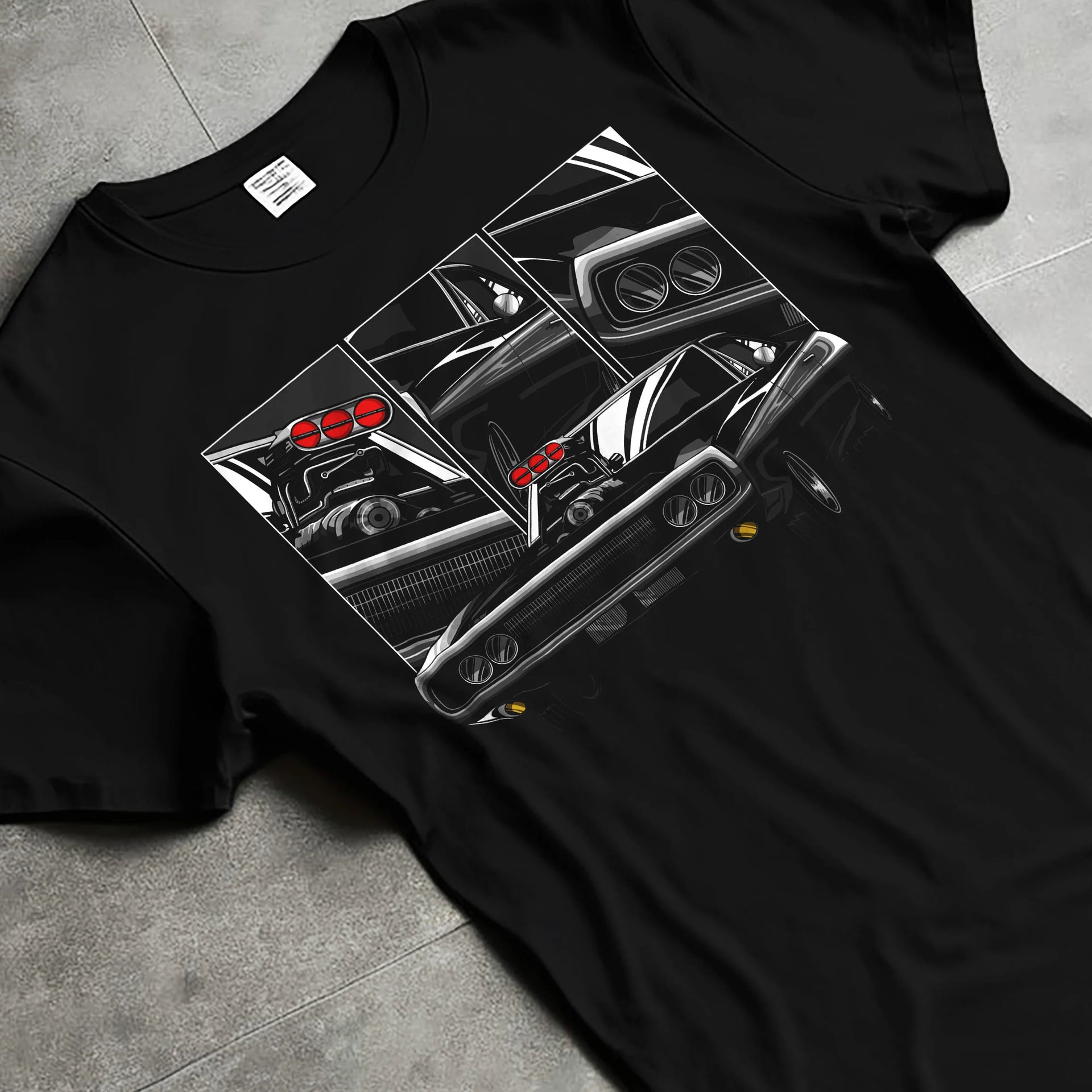 Black T-shirt laid flat with natural fabric folds, featuring Dodge Charger supercharged american muscle classic enthusiast graphic.