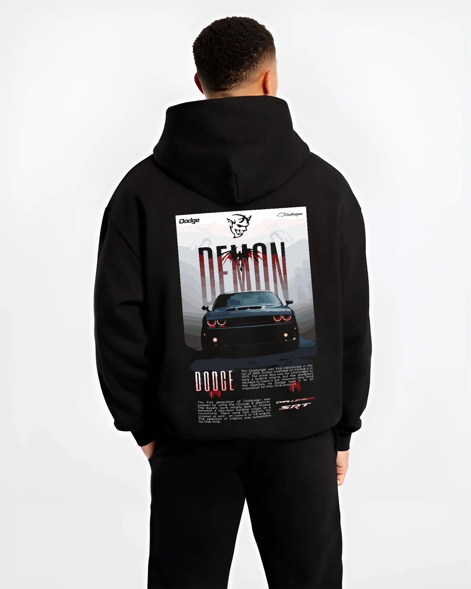 Black hoodie worn by a male model, back view, featuring Dodge Challenger racing muscle street retro enthusiast performance graphic.
