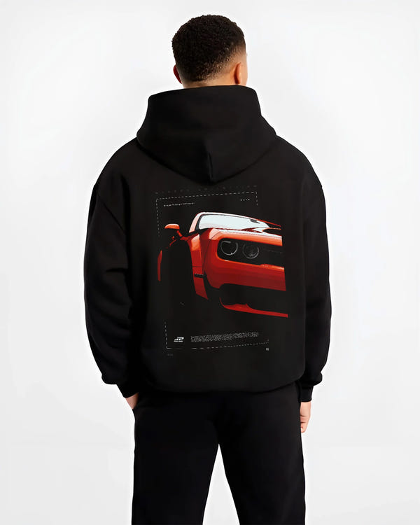 Black hoodie worn by a male model, back view, featuring Dodge Challenger srt racing muscle street enthusiast performance graphic.