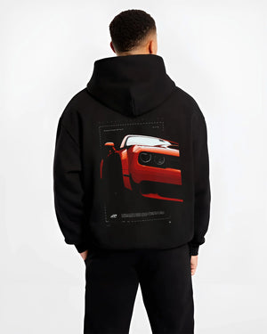 Black hoodie worn by a male model, back view, featuring Dodge Challenger srt racing muscle street enthusiast performance graphic.