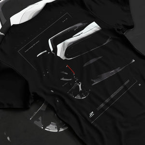 Black T-shirt laid flat with natural fabric folds, featuring Dodge Charger racing muscle street enthusiast performance graphic.