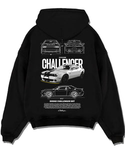 Black pullover hoodie laid flat on a white background, featuring Dodge Challenger srt turbo racing american muscle street graphic.
