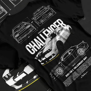 Black T-shirt laid flat with natural fabric folds, featuring Dodge Challenger srt turbo racing american muscle street graphic.