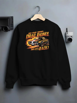 Black crewneck sweatshirt on a hanger against a grey wall, featuring turbo racing drag muscle street retro performance graphic.
